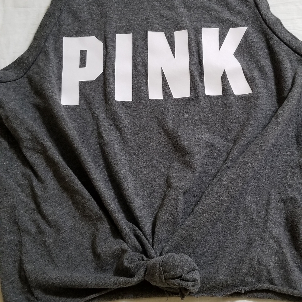 Pink tank top. Tag is missing but is xsmall. Cropped with raw hem. Soft & comfy